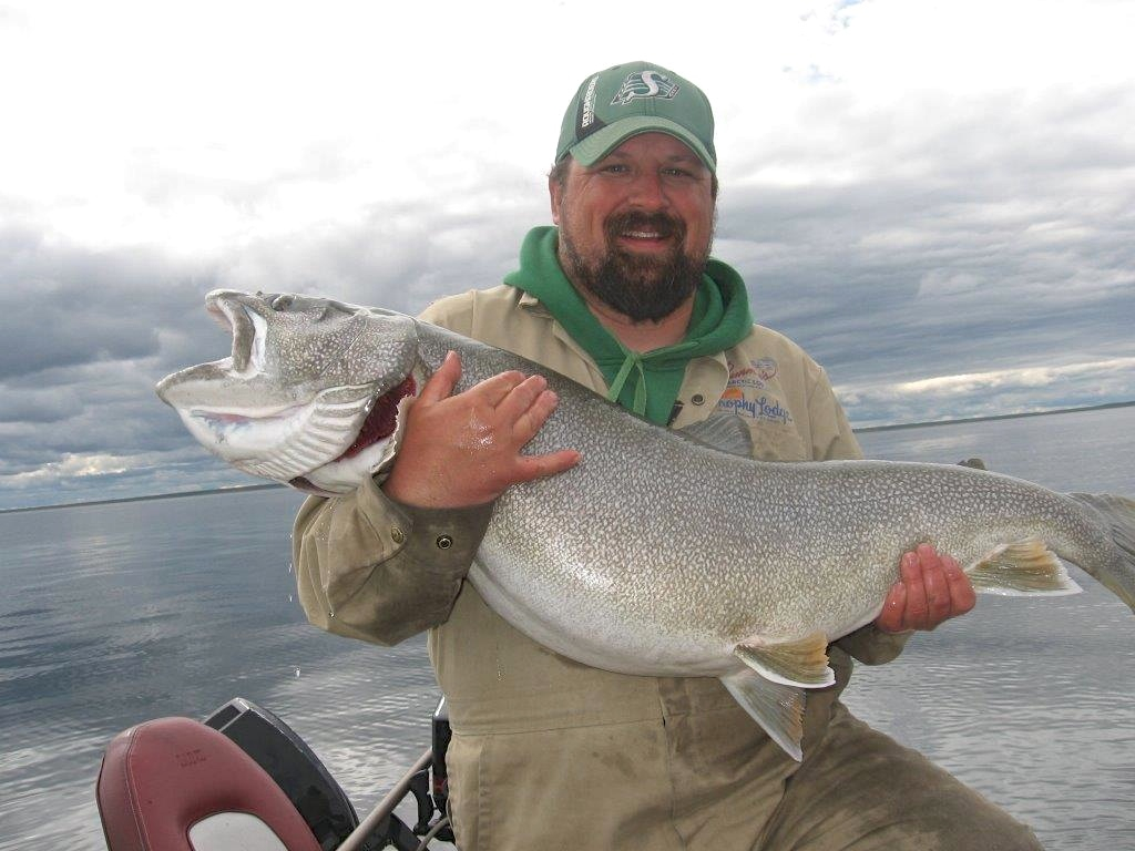 Guide Robin Stewart Holding Jim's 65 Pounder